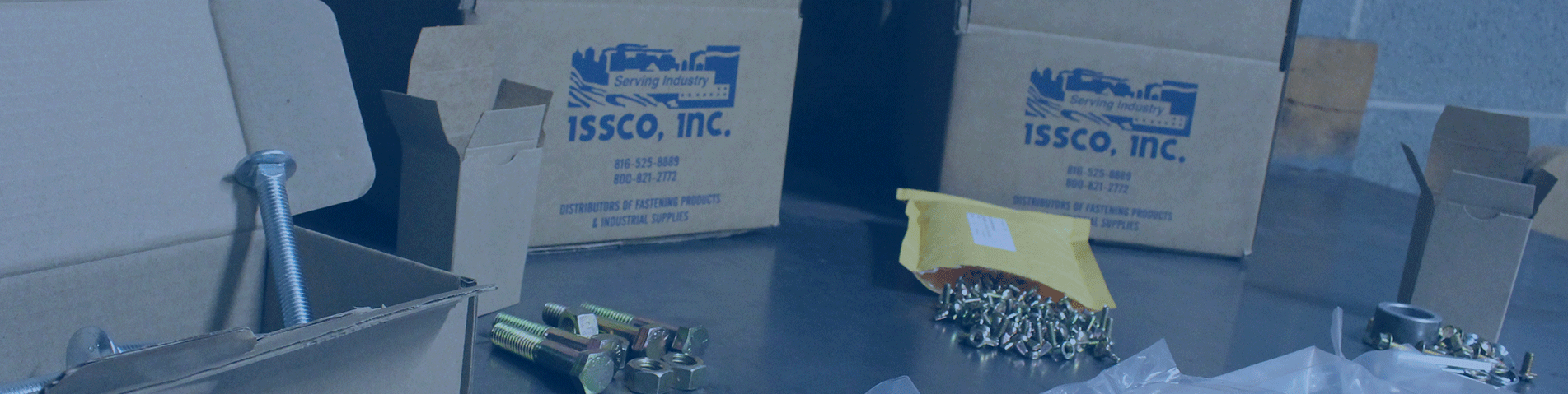 ISSCO boxes containing fasteners on a table