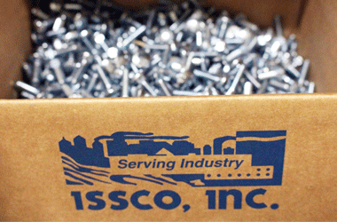 an opened box of fasteners